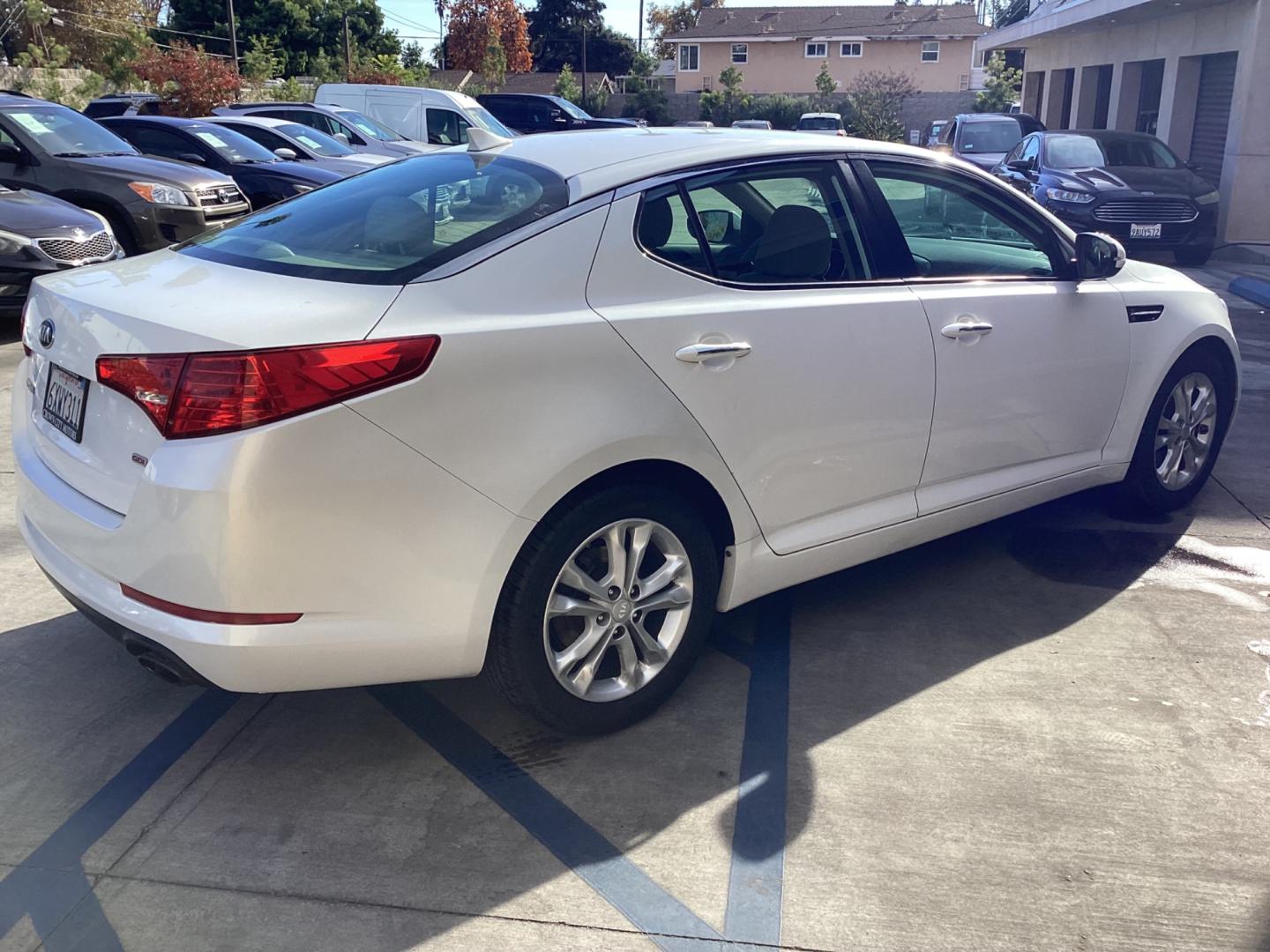 2013 WHITE Kia Optima (5XXGM4A72DG) , AUTOMATIC transmission, located at 30 S. Berkeley Avenue, Pasadena, CA, 91107, (626) 248-7567, 34.145447, -118.109398 - Crown City Motors is a used “Buy Here Pay Here” car dealer in Pasadena CA. “Buy Here Pay Here” financing, means that when you purchase your vehicle from our dealership, that you make the payments to the dealership as well. We do not need the banks approval to get you approved for a used auto - Photo#4